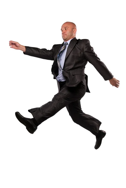 Man in business suit flies — Stock Photo, Image