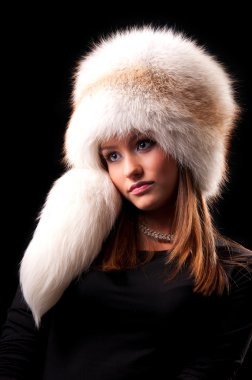 Woman in a fur hat clipart