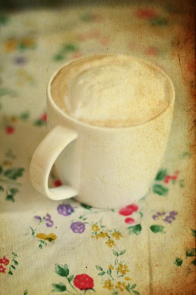 Vintage cup of cappuccino — Stock Photo, Image