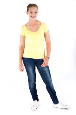 Beautiful young girl in stylish jeans clipart