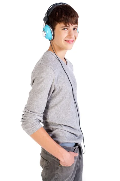 Mladý čerstvý teenager se sluchátky — Stock fotografie