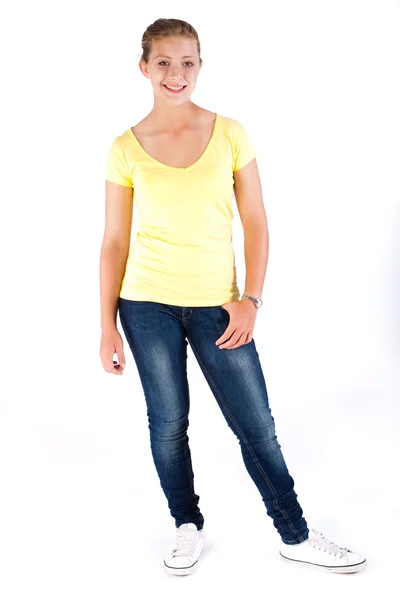 Beautiful young girl in stylish jeans — Stock Photo, Image