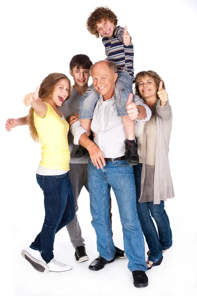 Thumbs-up famille posant dans le style — Photo