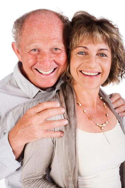 Tillgiven gubbe kramar sin fru bakifrån — Stockfoto