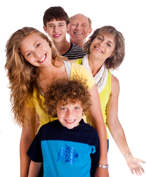 Retrato de família feliz de pé em uma fileira — Fotografia de Stock