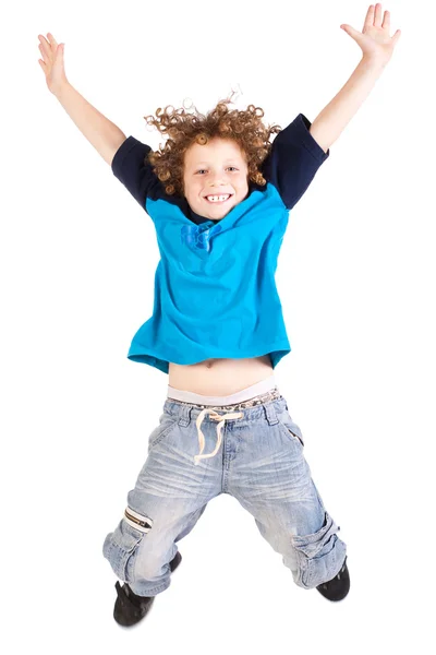 Jovem e atraente criança pulando alto — Fotografia de Stock