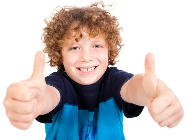 Smilling roztomilý chlapeček směřují palec nahoru — Stock fotografie