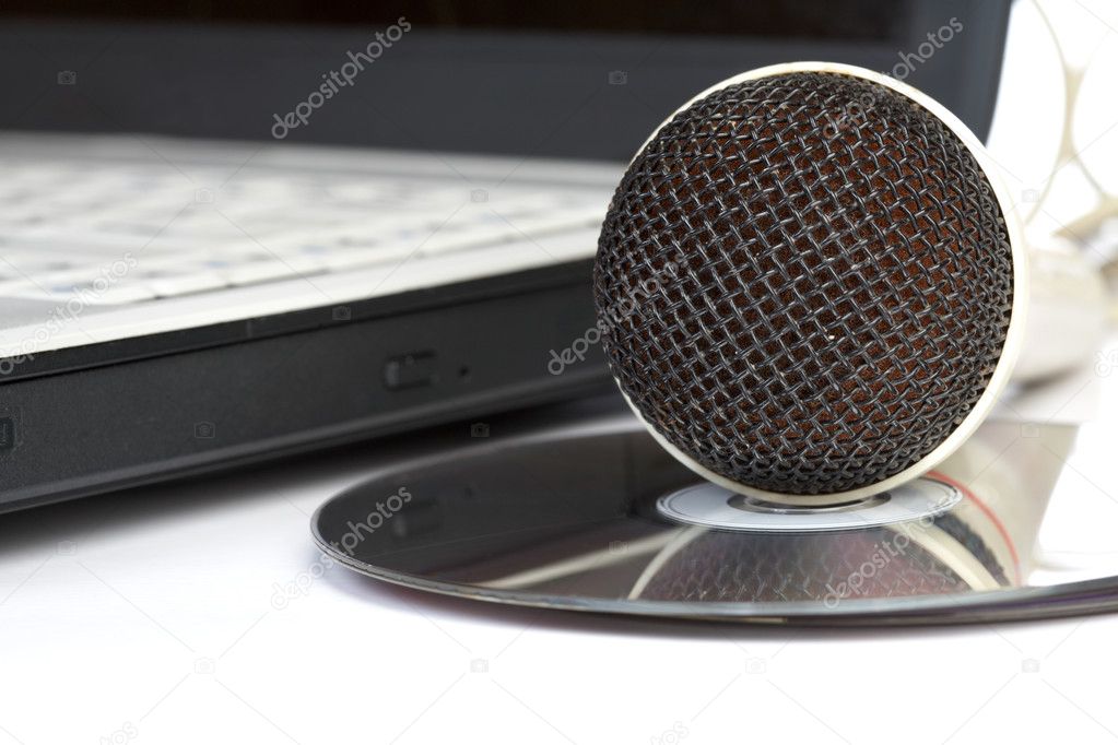 The microphone lays on notebook