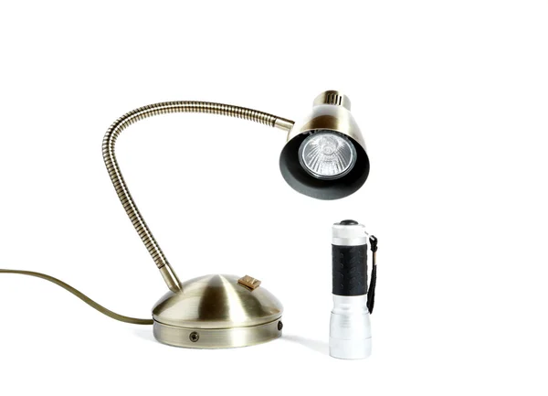 Lâmpada de secretária e lanterna manual — Fotografia de Stock
