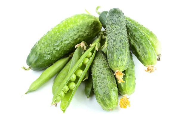 Green cucumbers and peas isolated — Stock Photo, Image