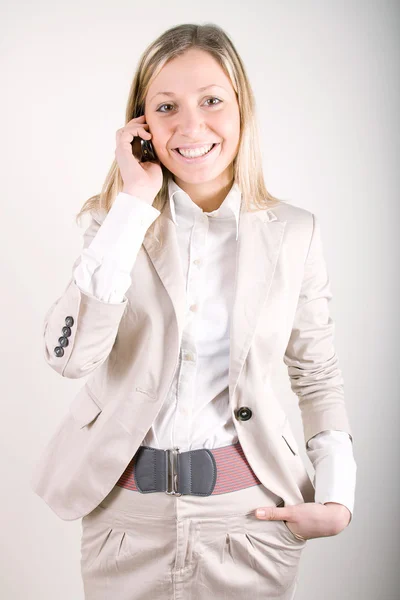 Business woman talking on cell phone — Stock Photo, Image