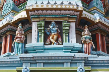 Sculptures on Hindu temple gopura (tower) clipart