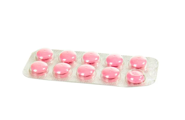Embalagem com comprimidos cor de rosa — Fotografia de Stock