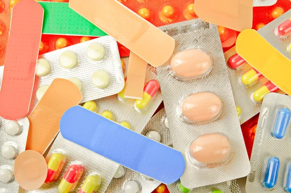 Multicolored medicine pills background — Stok fotoğraf