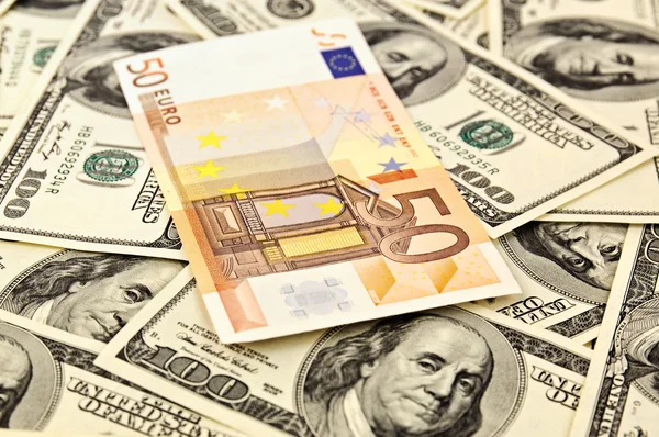 Dollar backround met euro — Stockfoto