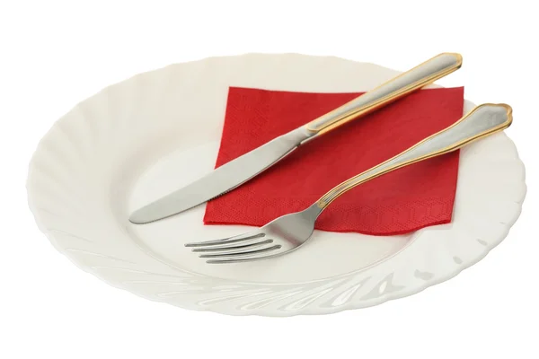 Fork and knife on a plate — Stock Photo, Image