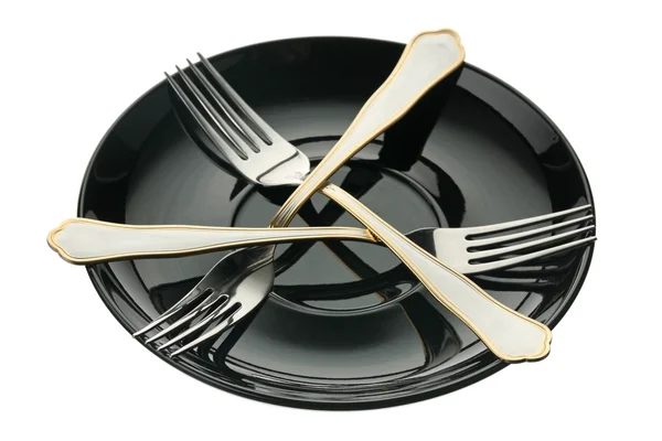 Tres tenedores en un plato — Foto de Stock