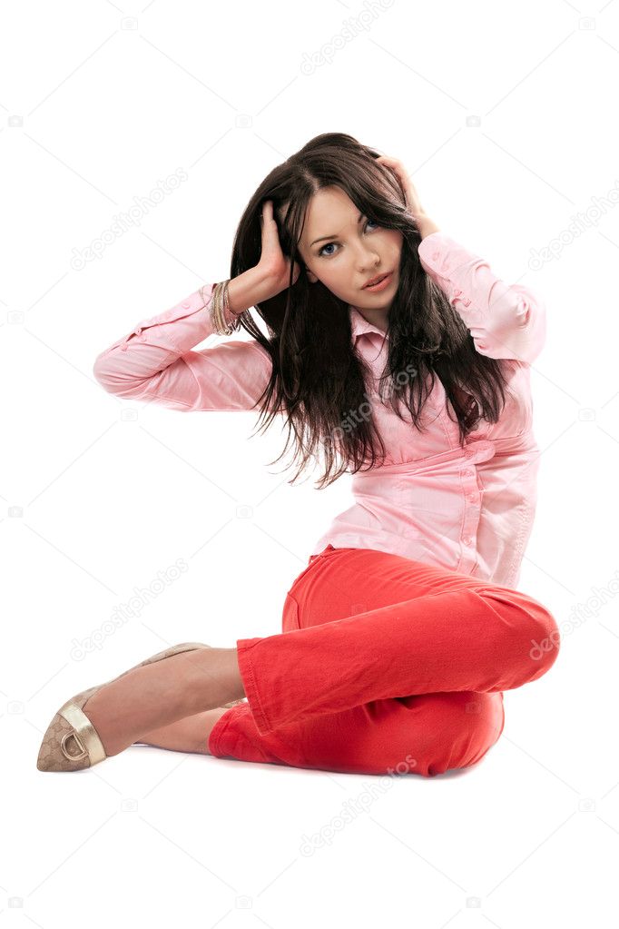 Sexy woman in red jeans. Isolated on white