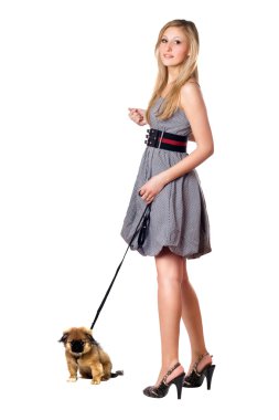 Blonde walking over her puppy clipart