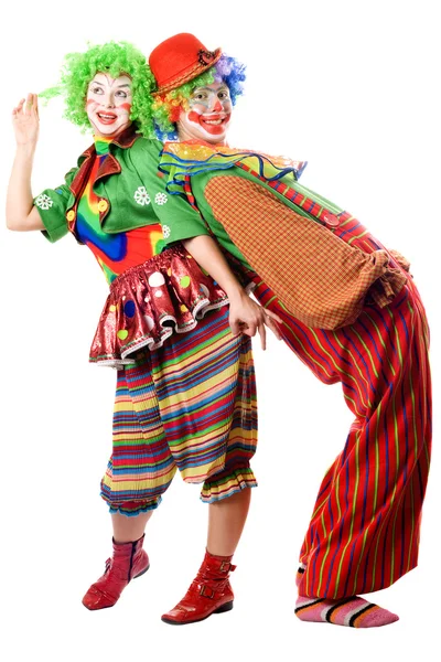 Twee clowns zijn rug aan rug — Stockfoto