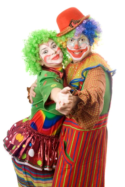 Een paar van gelukkig clowns dansen — Stockfoto