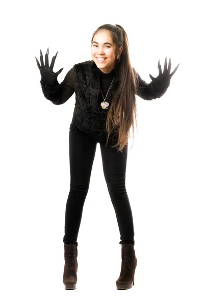 Playful young brunette in gloves with claws — Stock Photo, Image