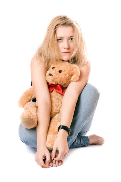 Pretty blonde with a teddy bear — Stock Photo, Image
