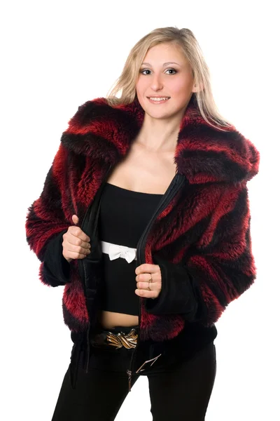 Young sexy blond woman in a fur jacket — Stock Photo, Image