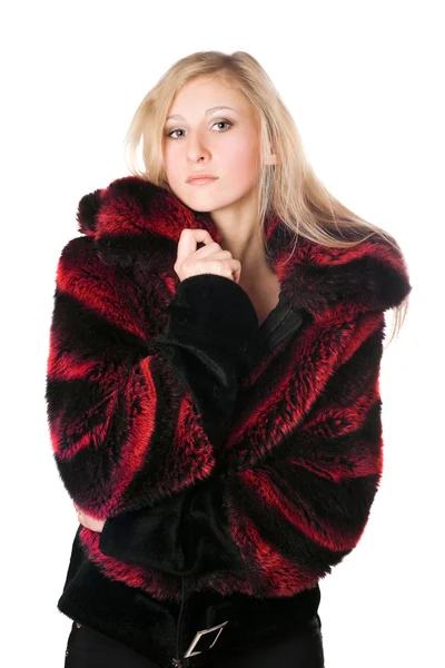 Young blond woman in a fur jacket — Stock Photo, Image