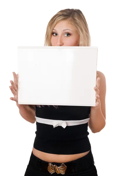 Mulher surpresa segurando placa branca — Fotografia de Stock