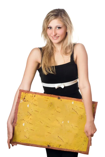 Blondin poserar med gula vintage styrelse — Stockfoto