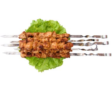 Shish kebab on skewers clipart