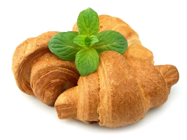 Fresh croissants with mint — Stock Photo, Image