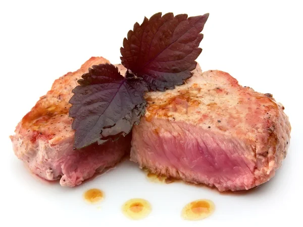 Juicy striped steak on wood table — Stock Photo, Image