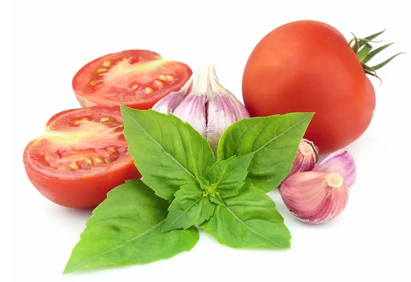 Sweet tomatoes with basil and garlic — Stock Photo, Image