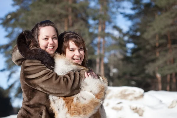 Two happy girls in winter — Stock Photo, Image