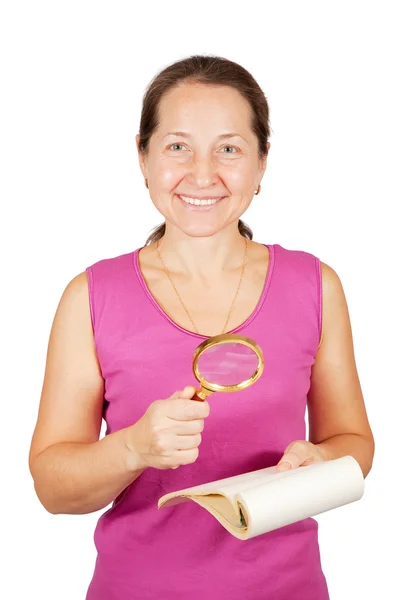 Woman looking at notebook through lens — Stock Photo, Image