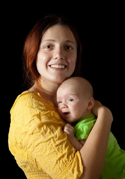 Женщина с 1 месяцем ребенка — стоковое фото