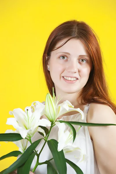 Girl with white lily flowers — Stock Photo, Image