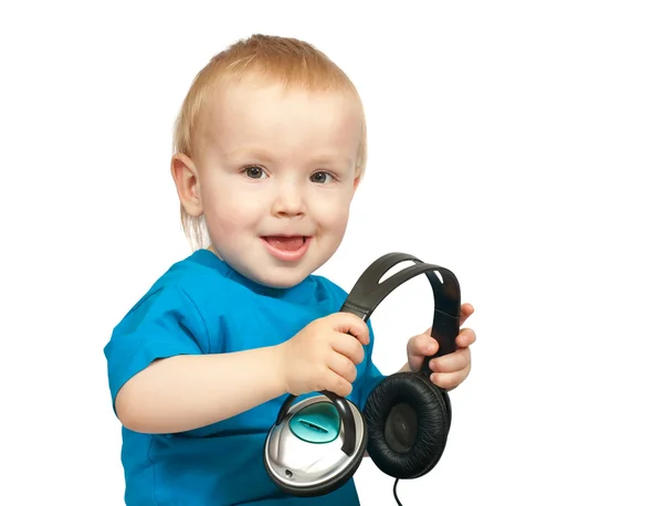 Маленький хлопчик з навушниками — стокове фото