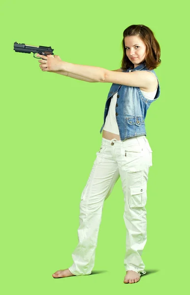 Meisje bedrijf pistool — Stockfoto