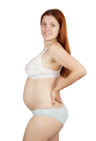 Donna incinta sopra bianco — Foto Stock