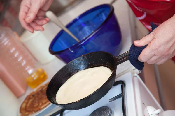 Pancake on griddle — Stock Photo, Image