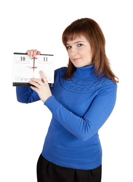 Girl pointing to date in flip calendar — Stock Photo, Image