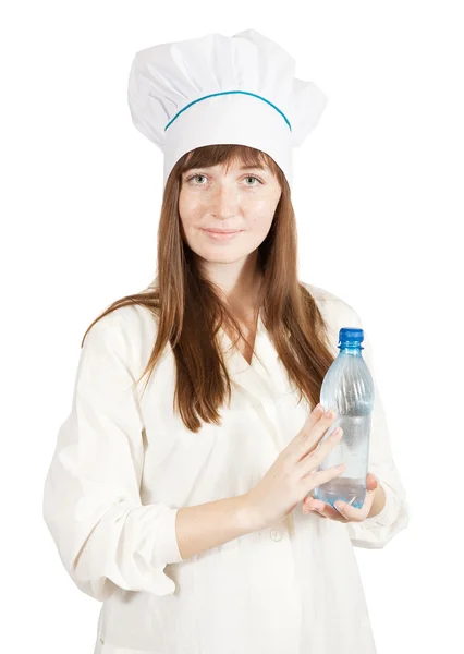 Женщина-повар с бутылкой — стоковое фото