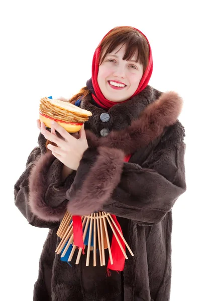 Woman in fur coat with pancake — Stock Photo, Image