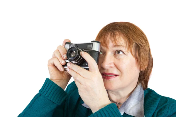 Жінка фотографує з старовинною камерою — стокове фото