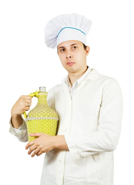 Cozinhe o homem no toque com garrafa — Fotografia de Stock