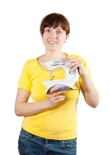 Girl with sewing machine — Stock Photo, Image