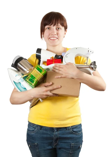 Kobieta w kolorze żółtym z urządzeń gospodarstwa domowego — Zdjęcie stockowe